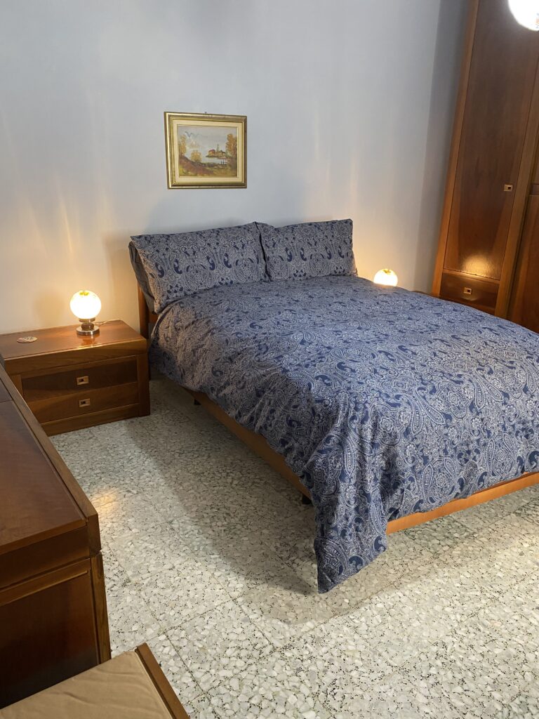 bedroom two with lighting